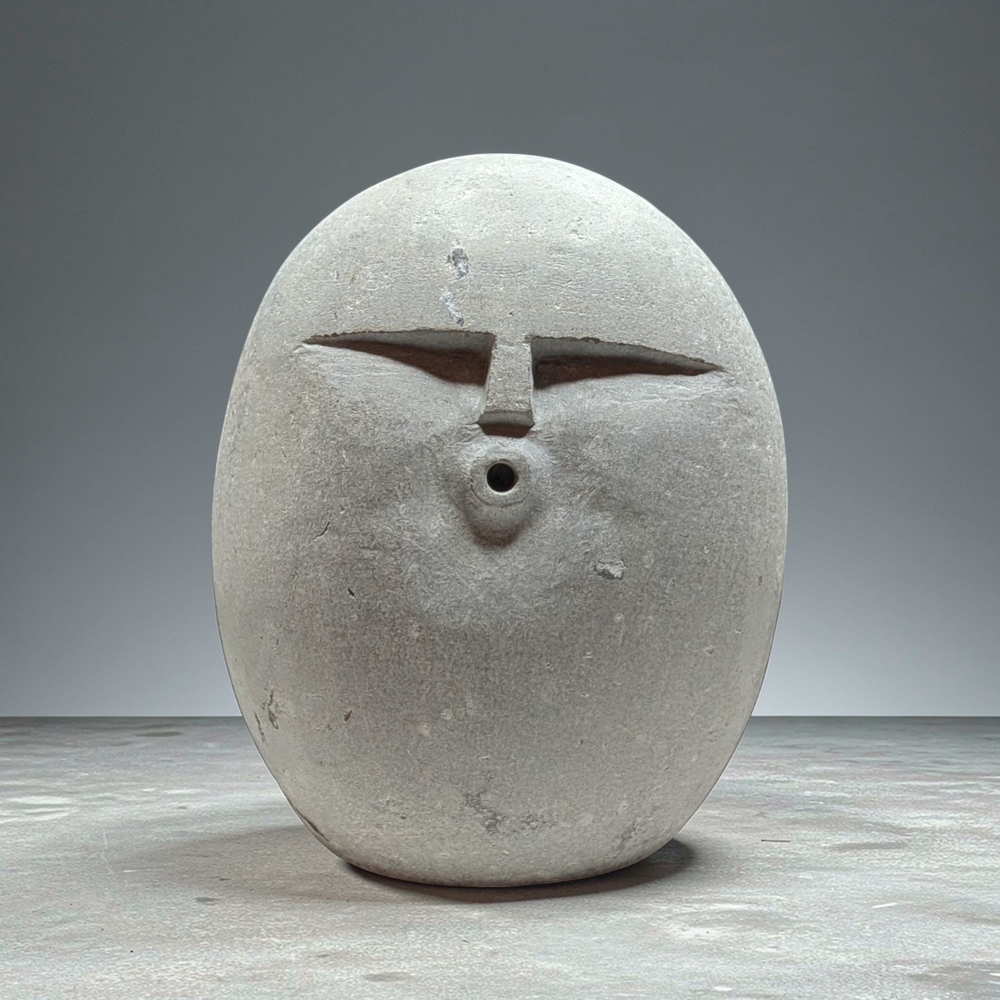 Hand carved OOF stone sculpture – natural pebble garden ornament handmade by Stone and Root