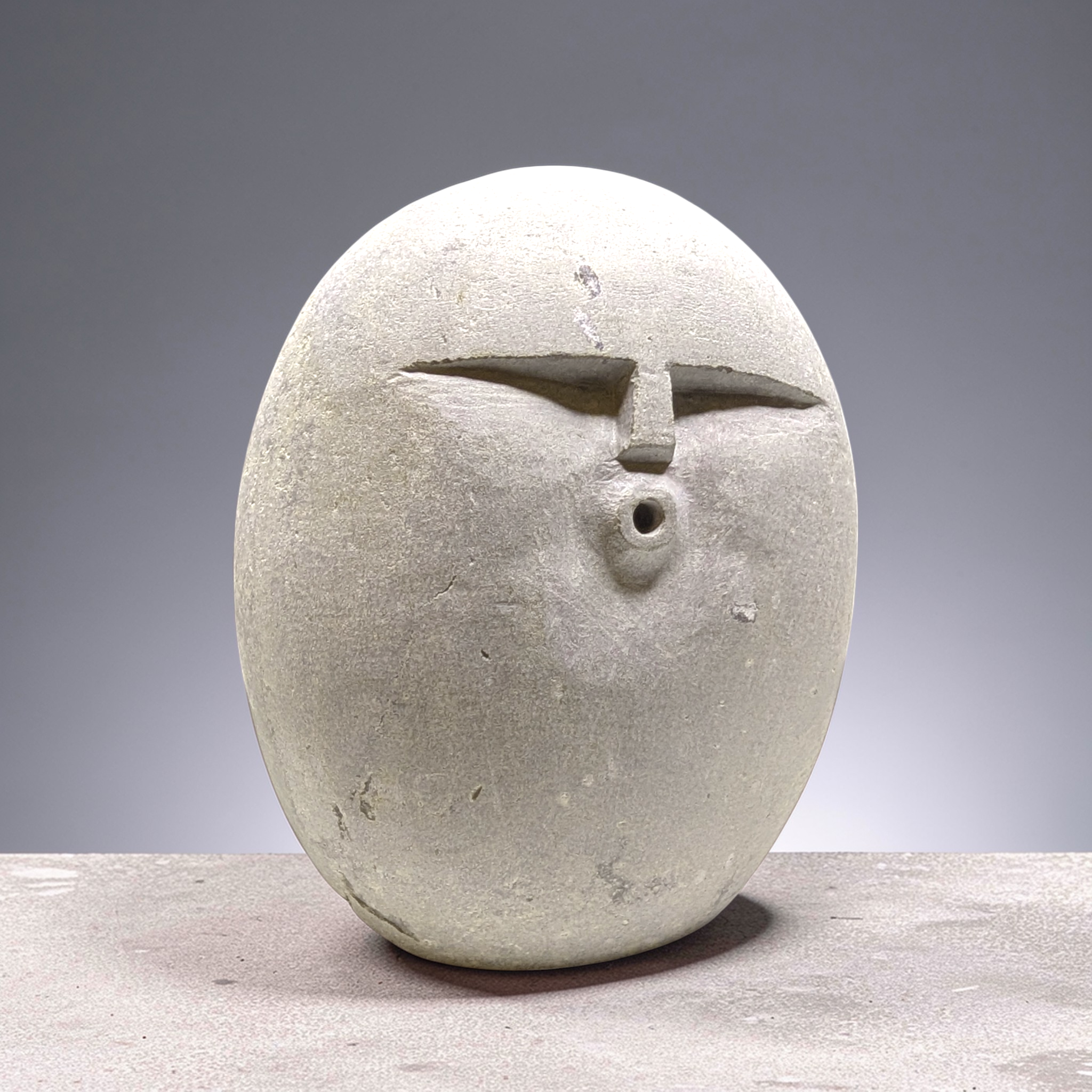 Hand carved OOF stone sculpture – natural pebble garden ornament handmade by Stone and Root