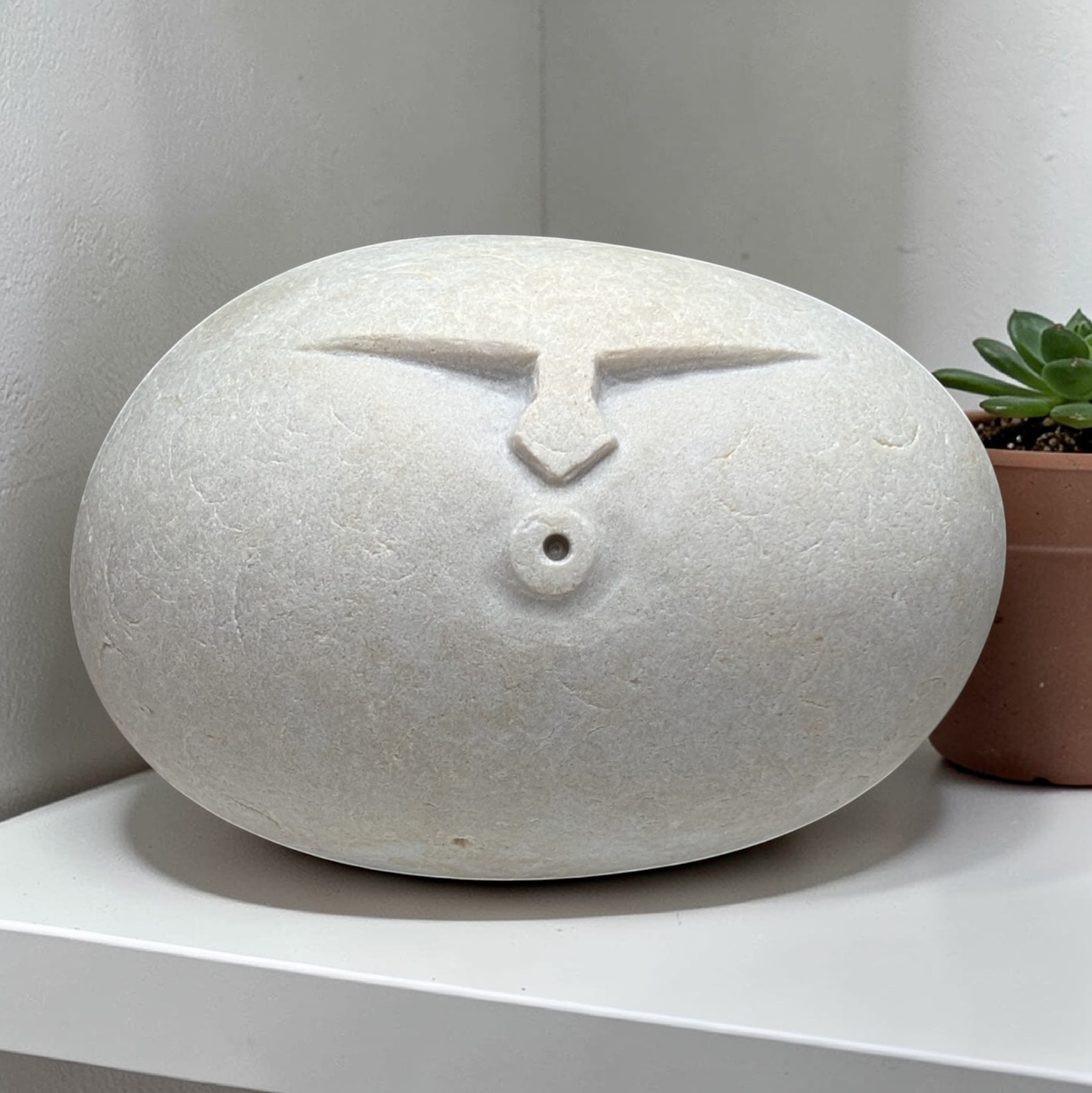 Hand carved OOF stone sculpture – natural pebble garden ornament handmade by Stone and Root