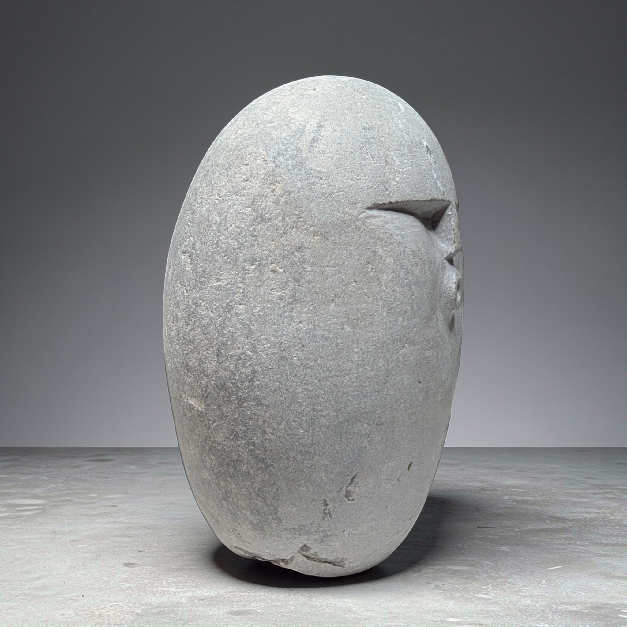 Hand carved OOF stone sculpture – natural pebble garden ornament handmade by Stone and Root