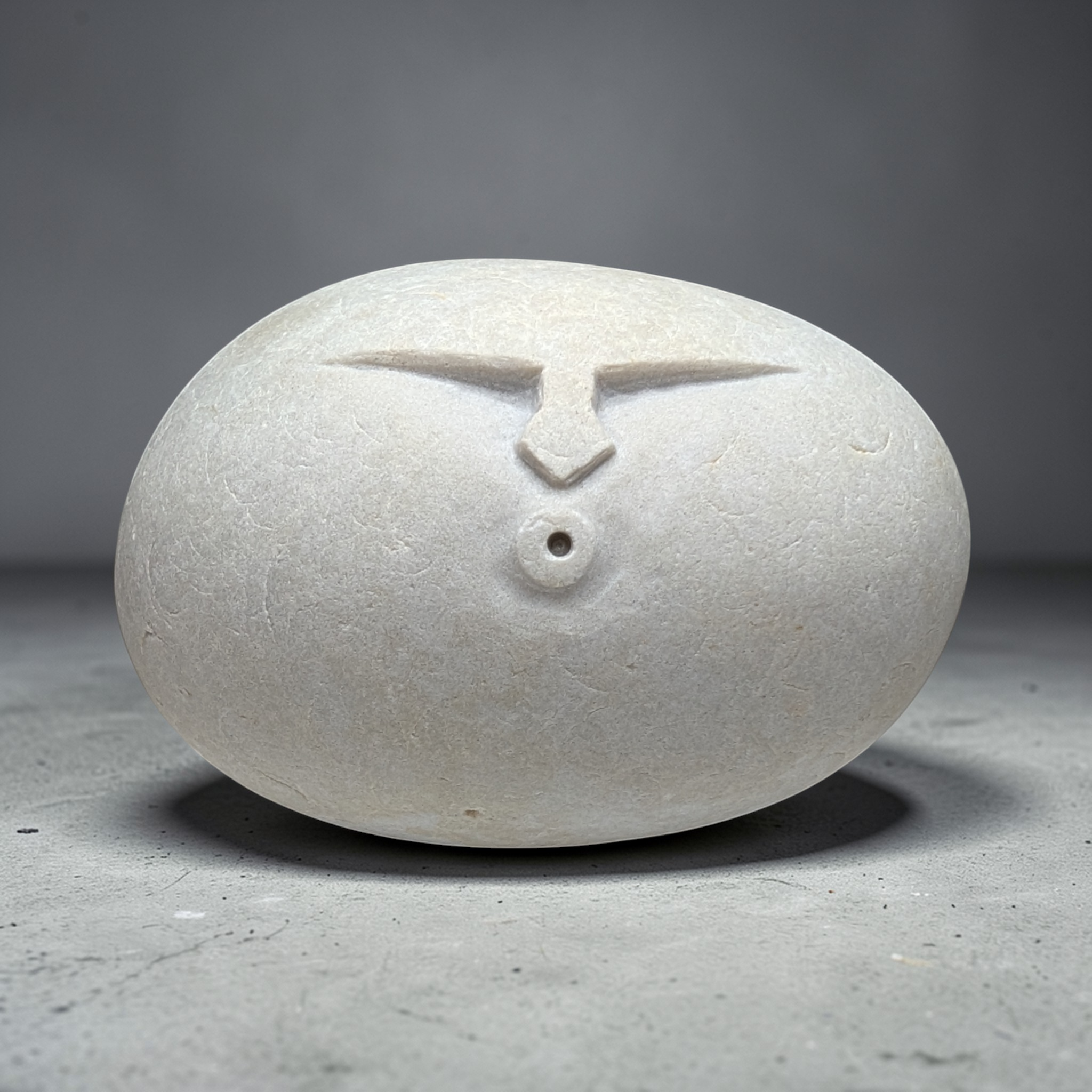Hand carved OOF stone sculpture – natural pebble garden ornament handmade by Stone and Root
