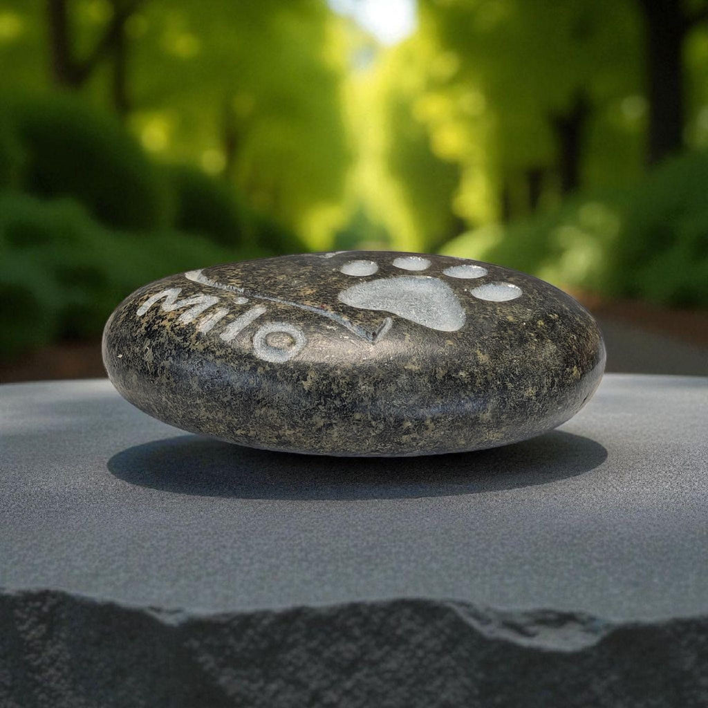 Personalised pet pebble with a paw print. Handcrafted.