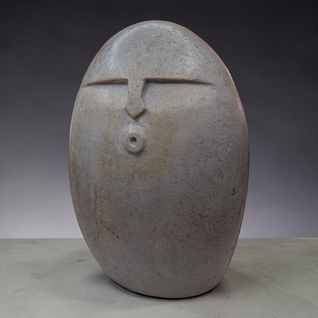 Handmade Stone OoF Face Sculpture: Quirky Home Decor