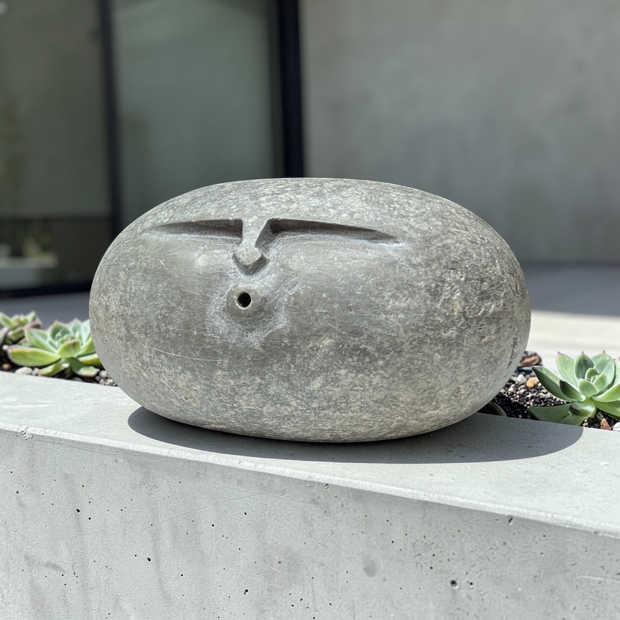 Hand-Carved Stone Oof – Heavy Natural Pebble Face Sculpture for garden and home decor